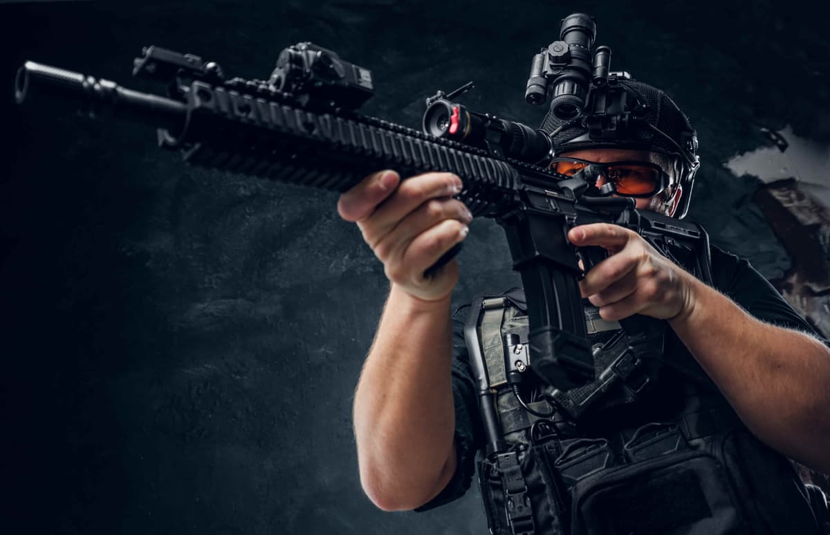 shooter aiming a rifle